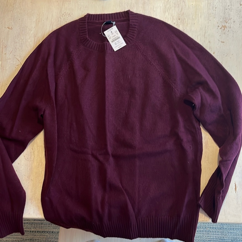 Tag still on CASHMERE sweater from J. Crew in a wine/burgundy color. Medium.